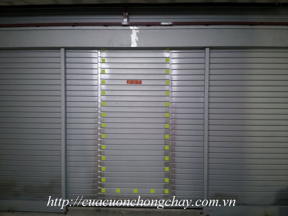 Fire shutter door korea , cửa cuốn ngắn cháy khẩn cấp. Cửa cuốn chống cháy 1 lớp Thép: Độ dầy 1.6ly± 8%, bản 8.5cm, khổ thép 13cm, sơn tĩnh điện